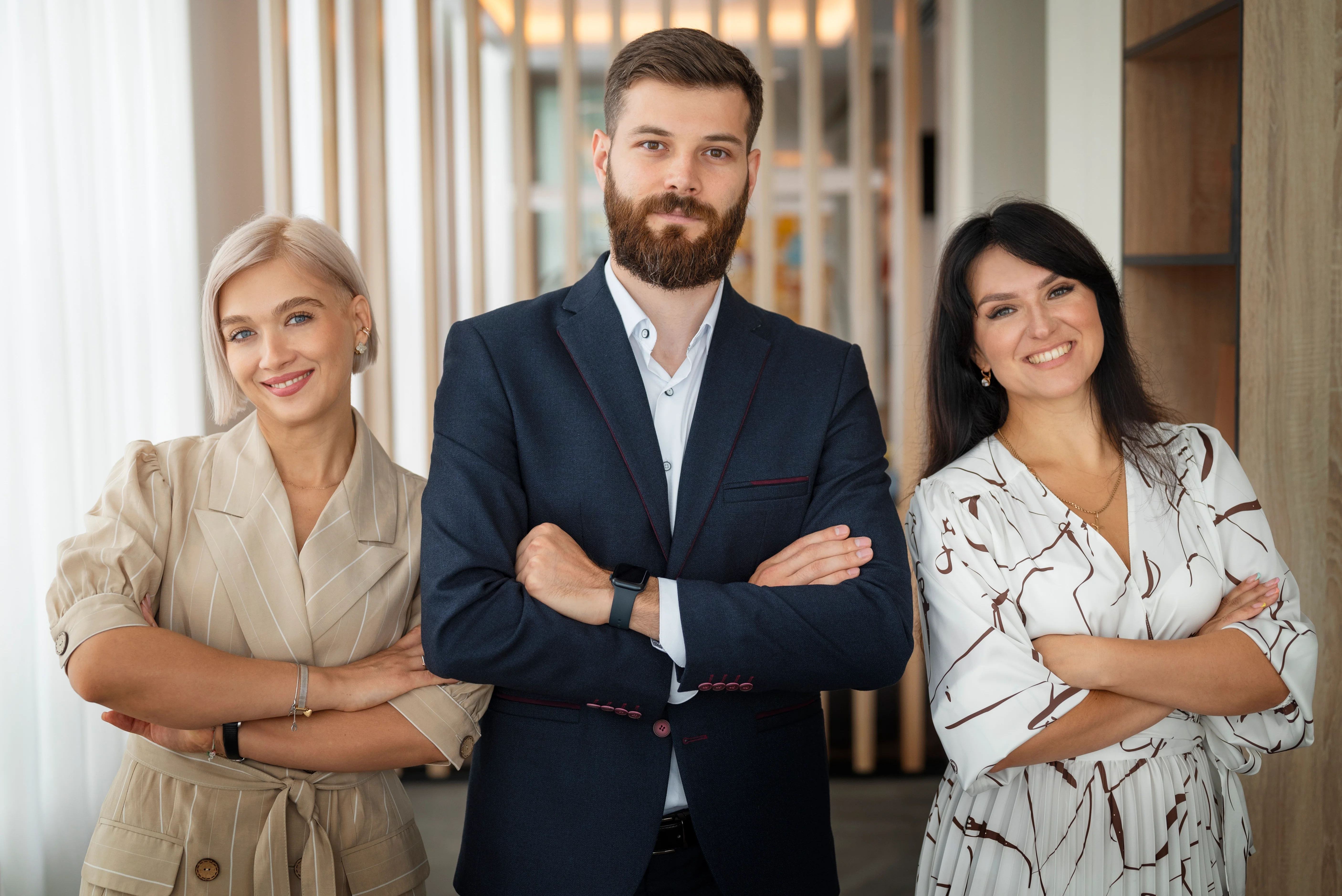 Team Care Compliance group headshots in the office